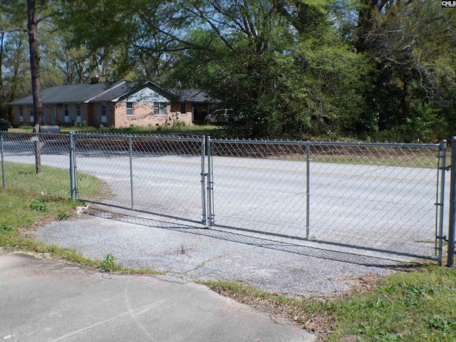 302 Baskin Ave, Bishopville, SC 29010 - view of gate featuring fence