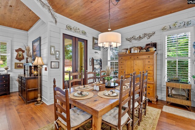 178 Pomaria St, Little Mountain, SC 29075 - dining area featuring light wood finished floors, wooden ceiling, french doors, and a healthy amount of sunlight