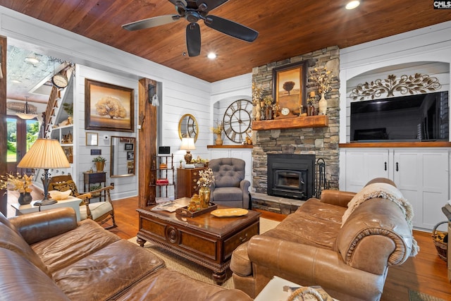 178 Pomaria St, Little Mountain, SC 29075 - living room with a stone fireplace, wood finished floors, wooden ceiling, and a ceiling fan