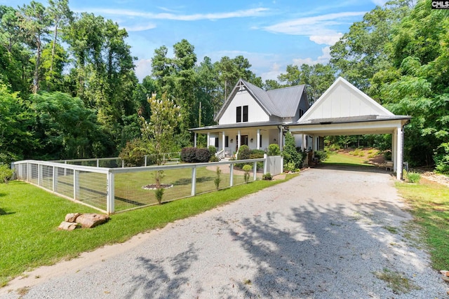 178 Pomaria St, Little Mountain, SC 29075 - view of front of house with fence, gravel driveway, a front yard, and a carport