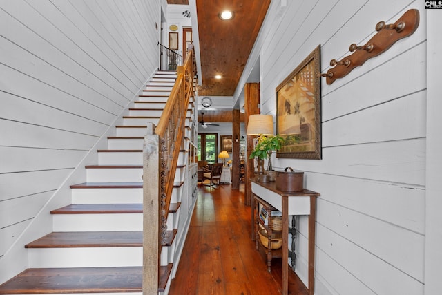 178 Pomaria St, Little Mountain, SC 29075 - stairs featuring wood walls and wood-type flooring