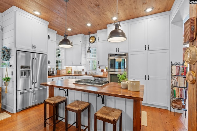 178 Pomaria St, Little Mountain, SC 29075 - kitchen featuring wooden counters, wooden ceiling, and stainless steel appliances