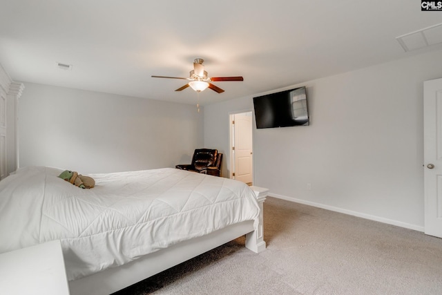 bedroom featuring baseboards, visible vents, carpet floors, and a ceiling fan
