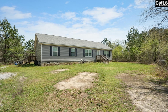 view of front facade with a front lawn and crawl space