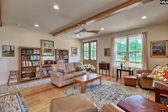 living area with wood finished floors, recessed lighting, a ceiling fan, and beam ceiling