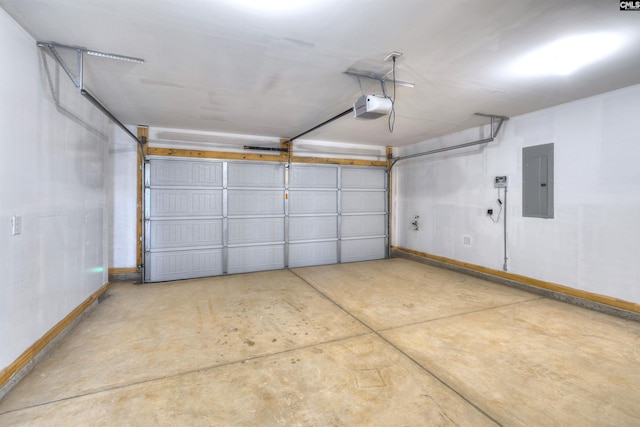 garage with baseboards, electric panel, and a garage door opener