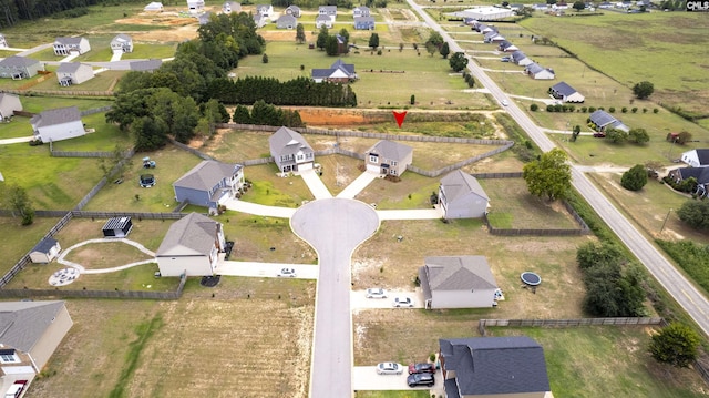 aerial view featuring a residential view and a rural view