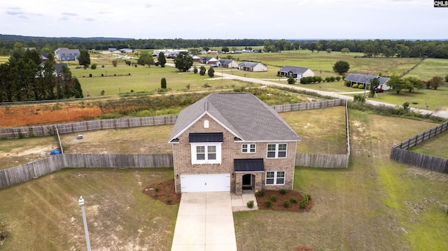 drone / aerial view with a rural view