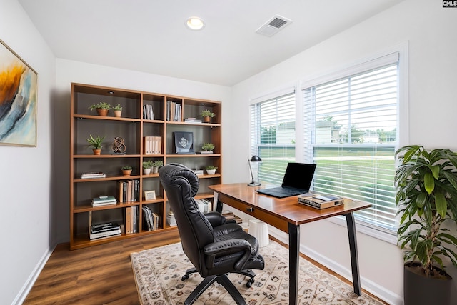 office space with baseboards, visible vents, wood finished floors, and recessed lighting