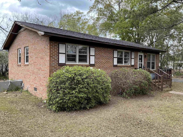 1157 Evans St, Florence, SC 29506 - ranch-style home with brick siding, crawl space, and central AC