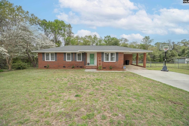 2008 Arnett Dr, Camden, SC 29020 - ranch-style house with an attached carport, brick siding, fence, and concrete driveway