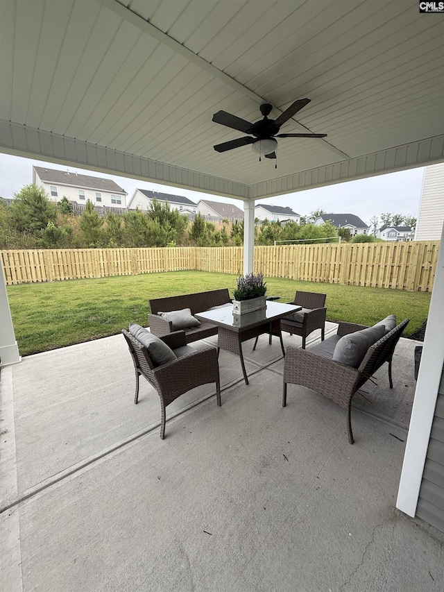 429 Greekmill Rd, Elgin, SC 29045 - fenced backyard with a patio, outdoor lounge area, and ceiling fan
