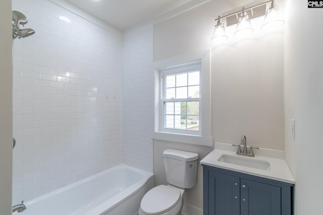 bathroom featuring toilet, vanity, and shower / bath combination