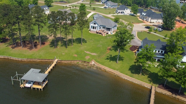 aerial view with a residential view and a water view