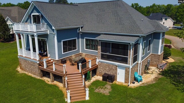 17 Big Water Vw, Ridgeway, SC 29130 - back of house with brick siding, a yard, a deck, and roof with shingles