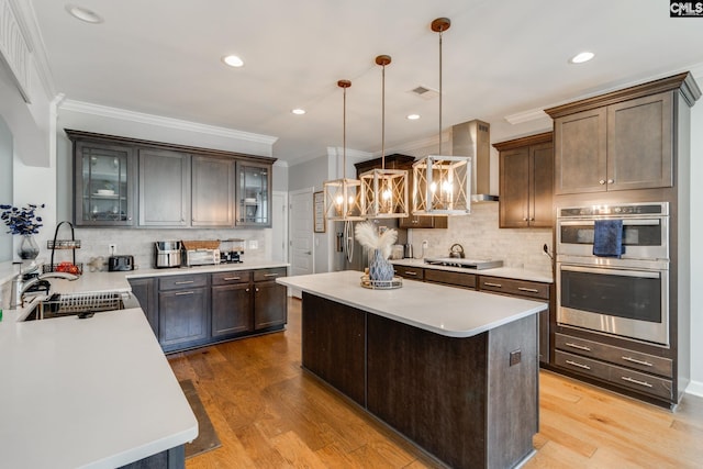 232 Compass Trl, Blythewood, SC 29016 - kitchen with light wood-style floors, glass insert cabinets, appliances with stainless steel finishes, a sink, and light countertops