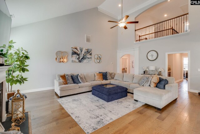 232 Compass Trl, Blythewood, SC 29016 - living area featuring arched walkways, wood finished floors, a ceiling fan, and visible vents
