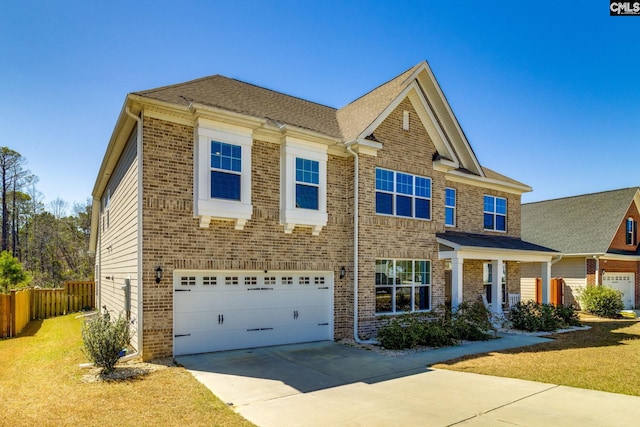 232 Compass Trl, Blythewood, SC 29016 - view of front of property with a garage, fence, a front lawn, brick siding, and concrete driveway