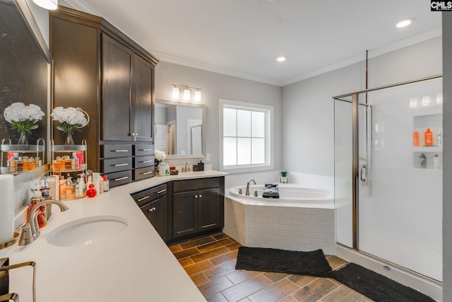 232 Compass Trl, Blythewood, SC 29016 - bathroom featuring vanity, ornamental molding, a shower stall, wood tiled floor, and a garden tub