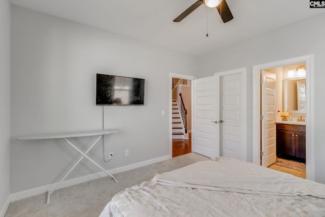 232 Compass Trl, Blythewood, SC 29016 - carpeted bedroom featuring baseboards, a ceiling fan, and connected bathroom