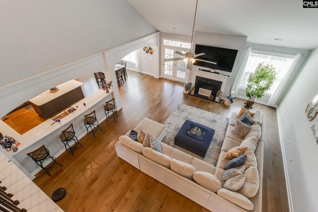 232 Compass Trl, Blythewood, SC 29016 - living room featuring ceiling fan, lofted ceiling, wood finished floors, and a fireplace