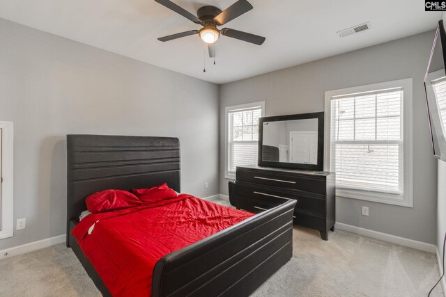 232 Compass Trl, Blythewood, SC 29016 - bedroom with visible vents, light colored carpet, baseboards, and a ceiling fan