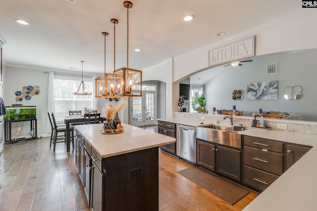 232 Compass Trl, Blythewood, SC 29016 - kitchen with light wood-style flooring, light countertops, visible vents, stainless steel dishwasher, and a sink