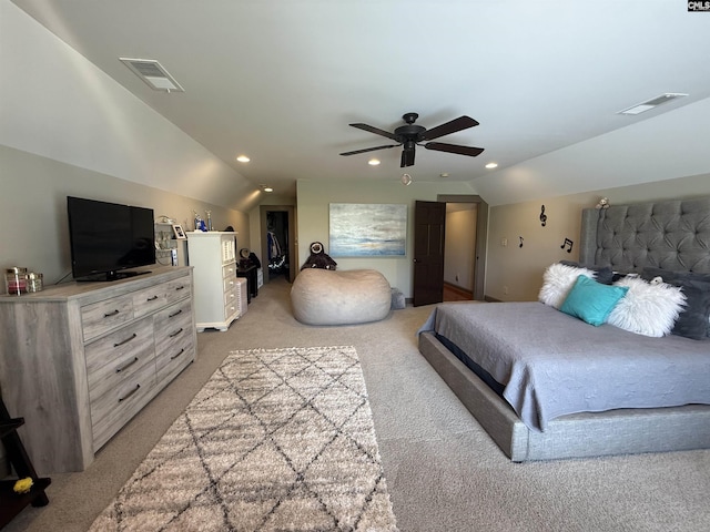 bedroom with visible vents, recessed lighting, and vaulted ceiling