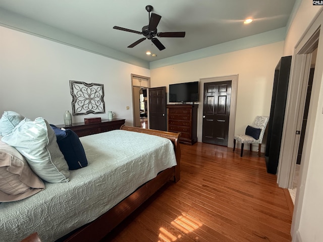 bedroom with recessed lighting, wood finished floors, and a ceiling fan