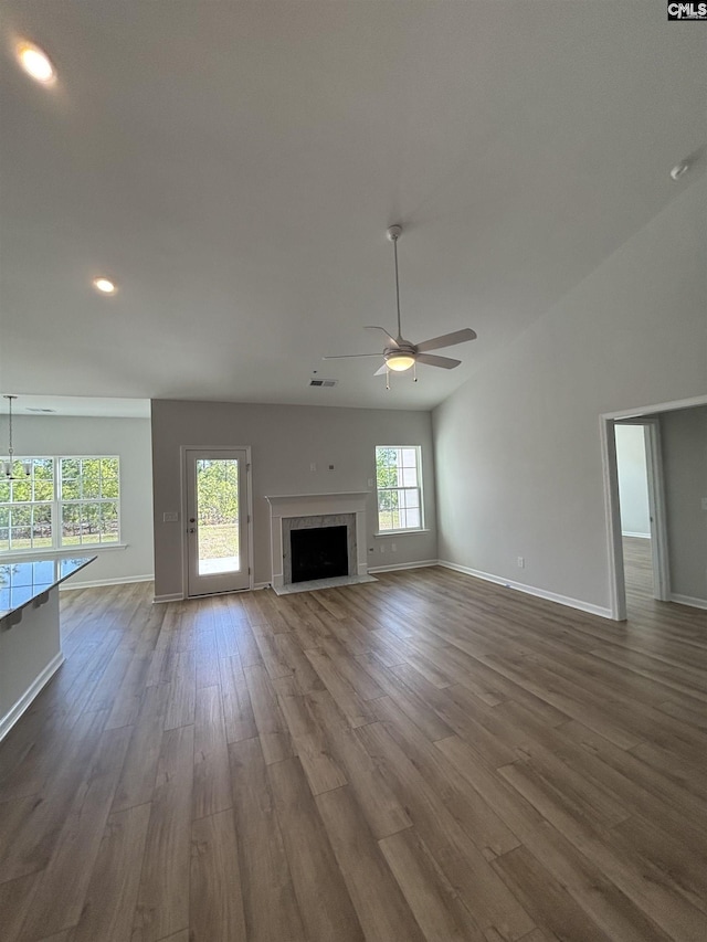 unfurnished living room featuring dark wood finished floors, recessed lighting, baseboards, visible vents, and a ceiling fan
