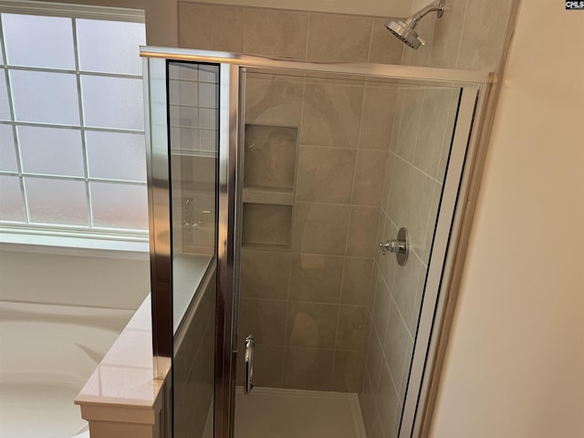 full bathroom with a stall shower