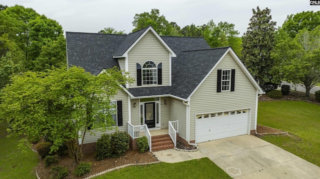 124 Pond Edge Ln, Chapin, SC 29036 - traditional-style home with a garage, roof with shingles, driveway, and a front lawn