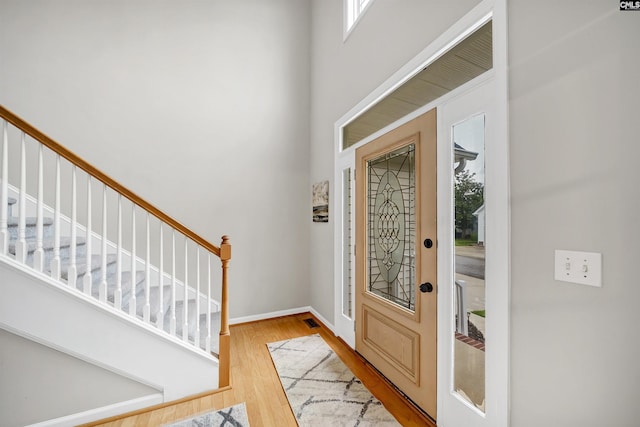 124 Pond Edge Ln, Chapin, SC 29036 - foyer with a wealth of natural light, baseboards, wood finished floors, and stairs