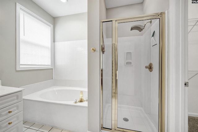124 Pond Edge Ln, Chapin, SC 29036 - full bath with a shower stall, a bath, vanity, and tile patterned floors