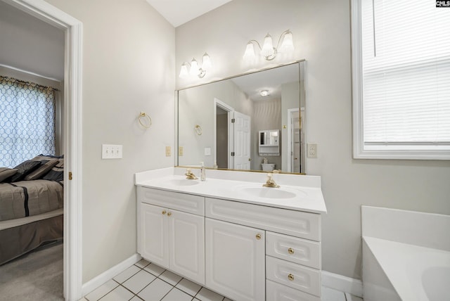 124 Pond Edge Ln, Chapin, SC 29036 - full bath with double vanity, ensuite bathroom, baseboards, and a sink