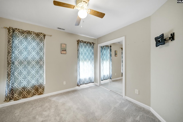 124 Pond Edge Ln, Chapin, SC 29036 - unfurnished bedroom featuring baseboards, a ceiling fan, visible vents, and carpet floors