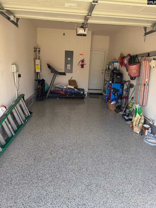 41 Carlisle Ln, Camden, SC 29020 - garage featuring electric panel and a garage door opener