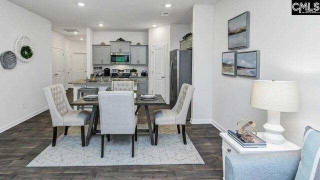 118A Willow Creek Blvd, Lugoff, SC 29078 - dining area featuring dark wood-style flooring, visible vents, baseboards, and recessed lighting