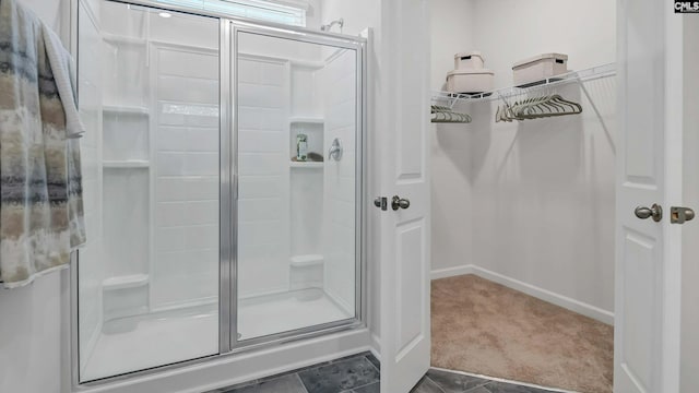 118A Willow Creek Blvd, Lugoff, SC 29078 - bathroom featuring a shower stall, baseboards, and tile patterned flooring
