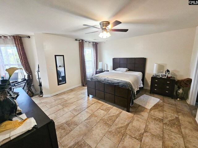 56 Kimpton Dr, Elgin, SC 29045 - bedroom featuring ceiling fan and baseboards