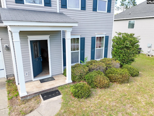 56 Kimpton Dr, Elgin, SC 29045 - view of exterior entry with a lawn