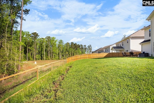 view of yard featuring fence