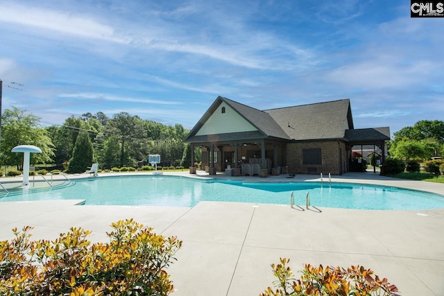 pool with a patio