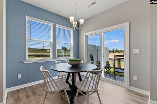 1071 Cornelia St, Elgin, SC 29045 - dining room featuring visible vents, baseboards, and light wood-type flooring