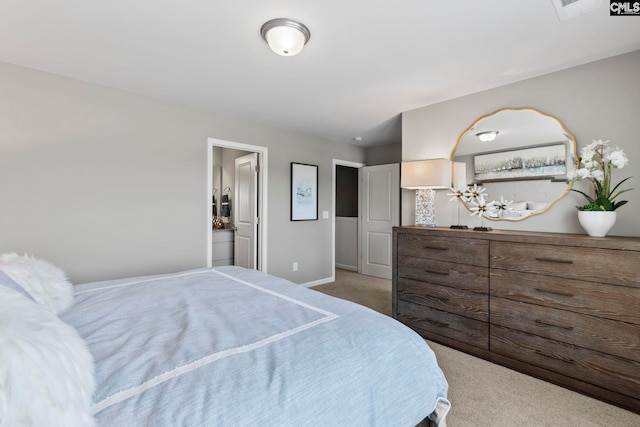 1071 Cornelia St, Elgin, SC 29045 - carpeted bedroom featuring baseboards and connected bathroom