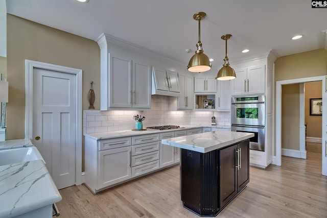 209 Mariannas Ct, Lexington, SC 29072 - kitchen with tasteful backsplash, light wood-type flooring, open shelves, decorative light fixtures, and appliances with stainless steel finishes