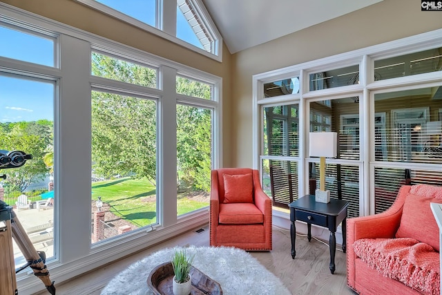 209 Mariannas Ct, Lexington, SC 29072 - sunroom featuring visible vents, wood finished floors, and lofted ceiling