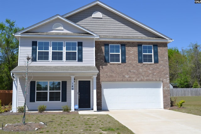 view of front facade featuring concrete driveway, a front lawn, brick siding, a garage, and fence