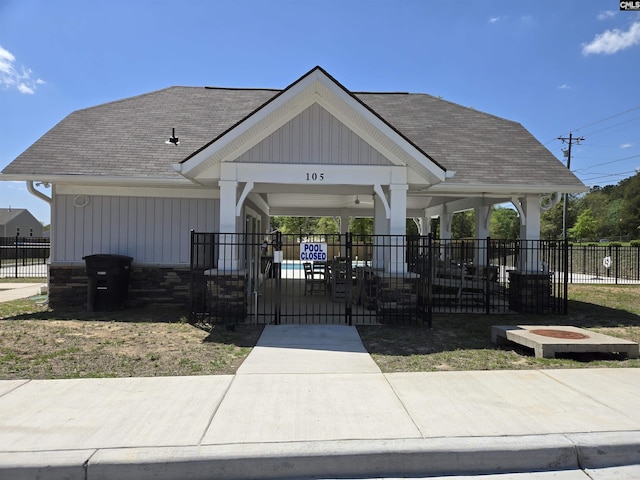 view of community with a gazebo and fence
