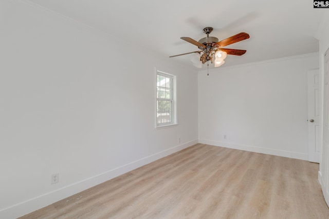 unfurnished room with light wood-type flooring, ceiling fan, baseboards, and ornamental molding